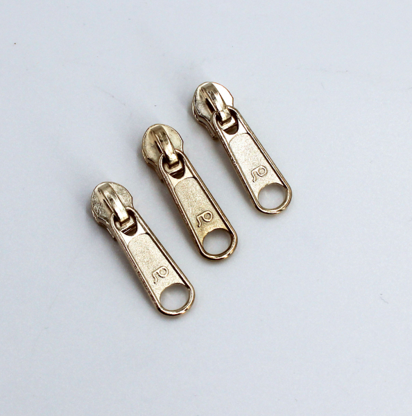 Endlosreißverschluss metallisiert schwarz/ eisgold (1m)